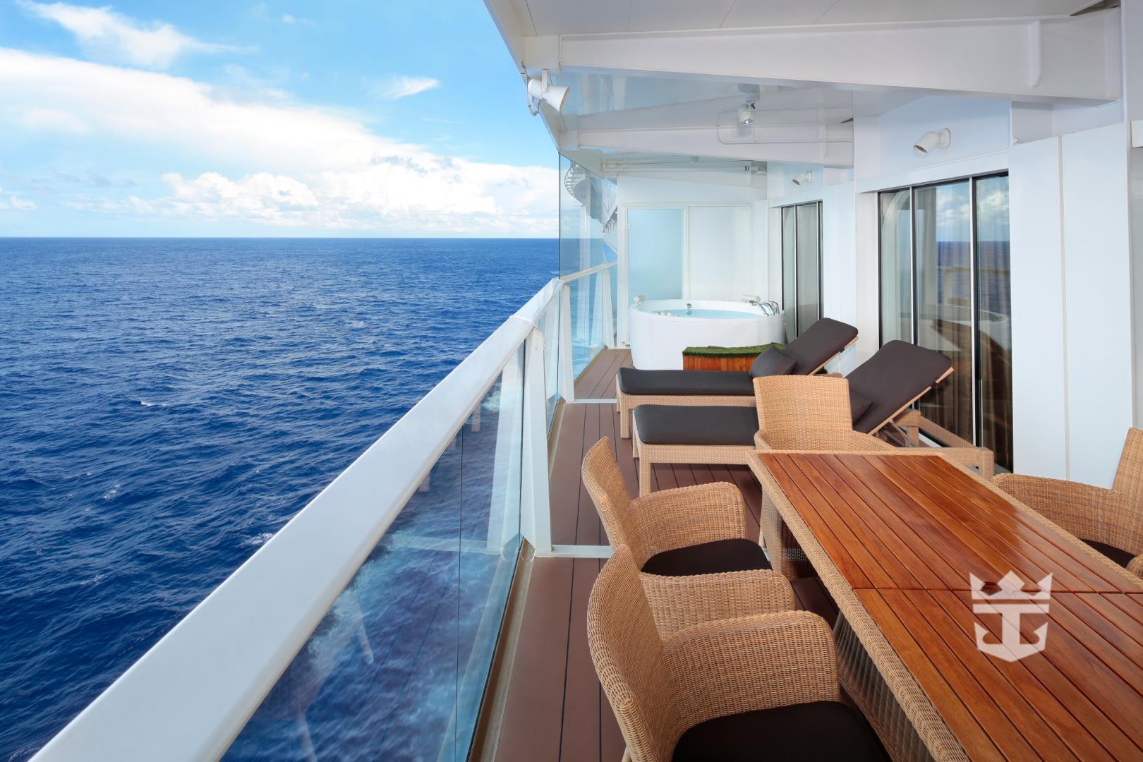 View of the ocean and seating on the Royal Family Suite balcony